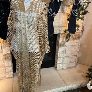 Ellie and Kate poncho can use as a cover up this summer one size - runs big.